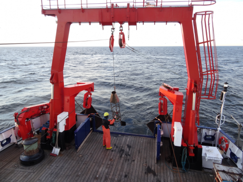 Towed CTD Probe going outboards for a transect. Photo:  Constantin Dransmann