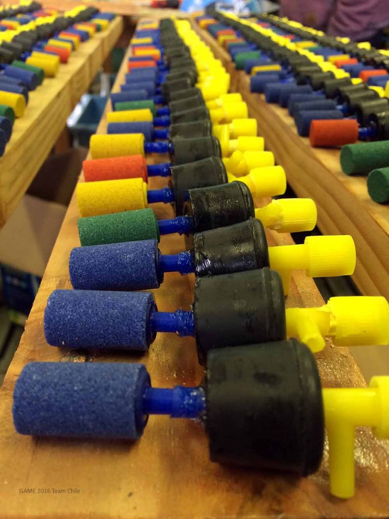 Hundreds of airstones glued to rubber stoppers with silicone...