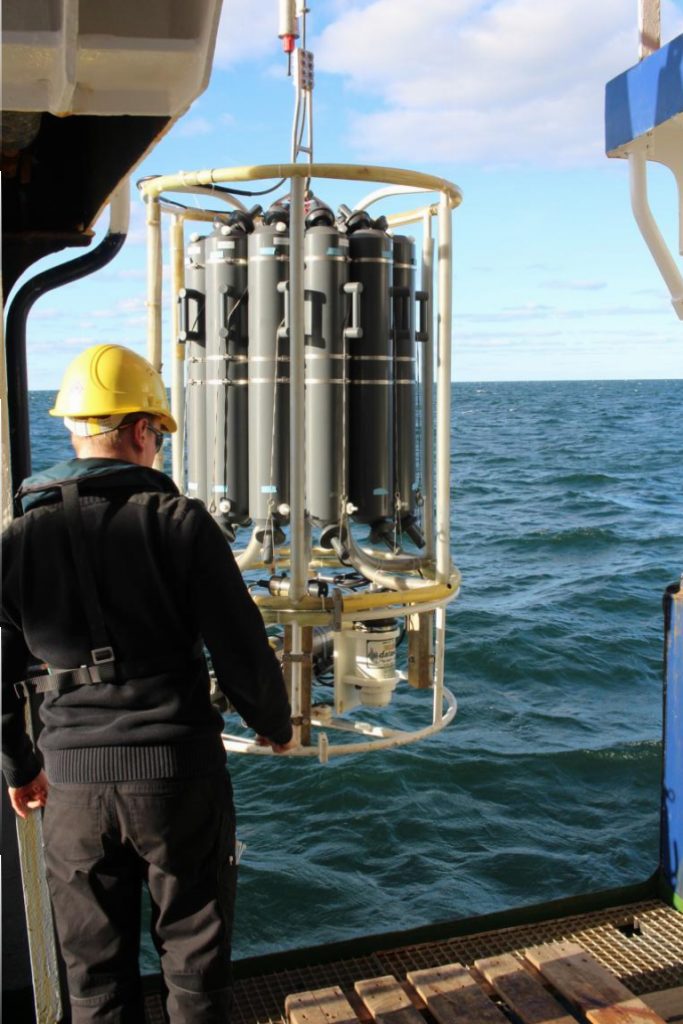 The CTD is released into the water by a crew member of the RV Poseidon to take measurements of water column properties. Photo by Nora-Charlotte Pauli