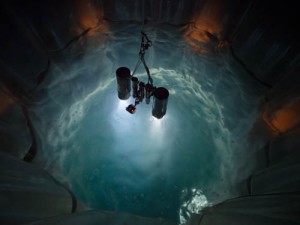 Camera "Enterprise" lowered into mesocosms at night; Photo by Michael Sswat