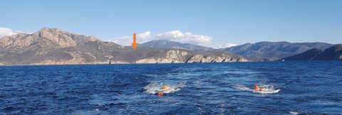 The position of a land seismometer on Corsica is marked by the orange arrow. In the water the orange bulbs mark the position of our airguns. Photo: A. Paul, ISTerre.