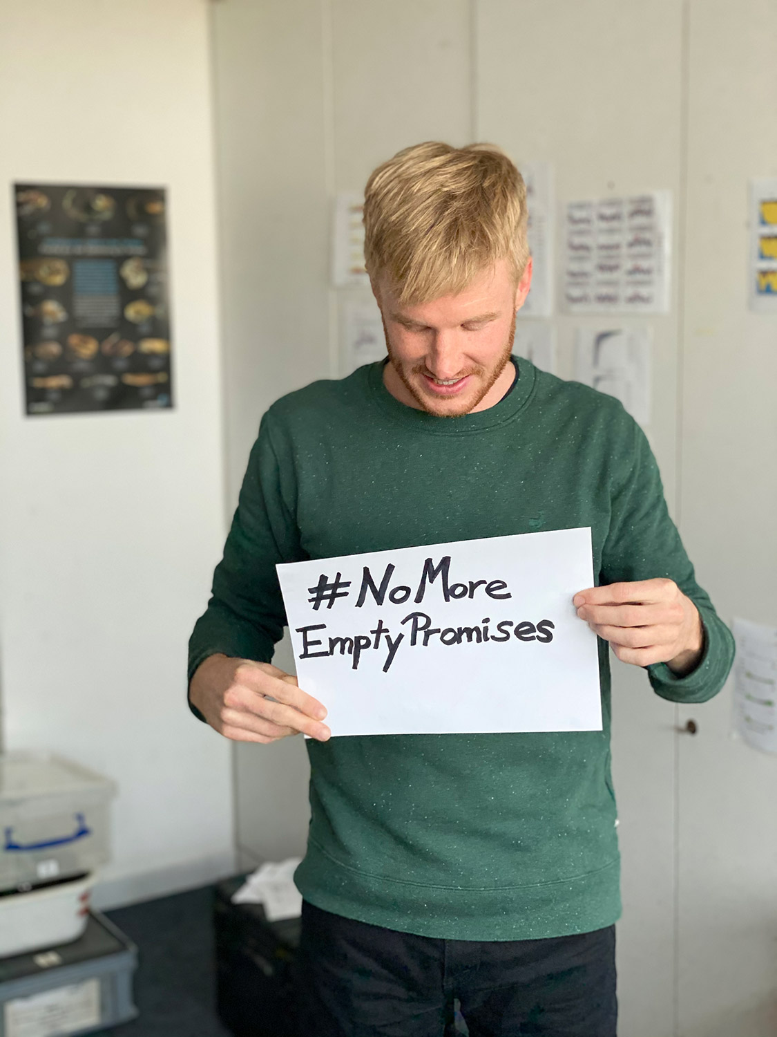 Moritz holding a climate sign