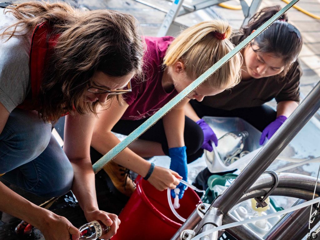 Scientists take water samples from the watertanks of the CTD. Photo: Steffen Niemann