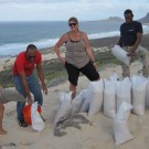 Filling sand sacks for weighing the dust sampling construction