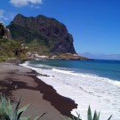 The coast of the island is mostly rocky with only a few beaches.