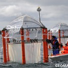 JC manoeuvres the water sampler into the mesocosm from a rocking boat. Photo: Maike Nicolai, GEOMAR