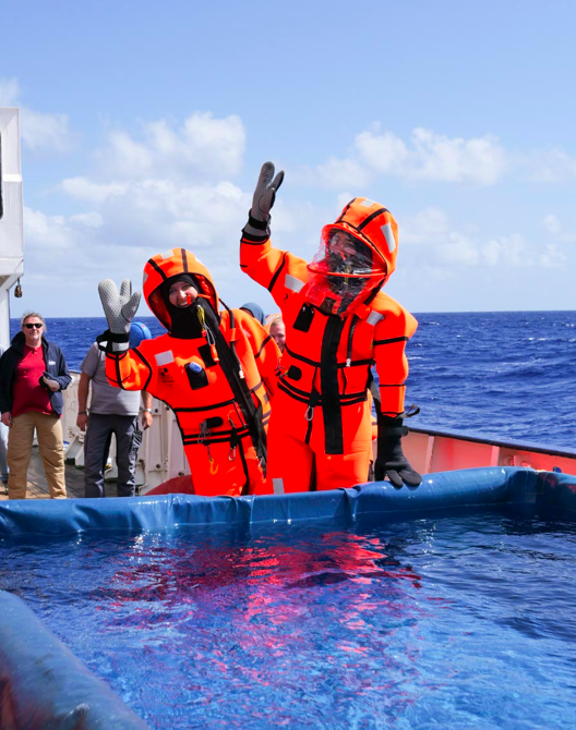 Luisa Sarmiento (right) and Christin Jahr (left) about to test survival suits in the pool. Photo by Martin Visbeck