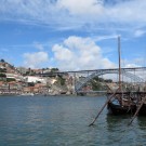 Porto with the river Douro, the Ponte Dom Luis I. and some traditional river boats for the transport of port wine. Photo: J. Steffen