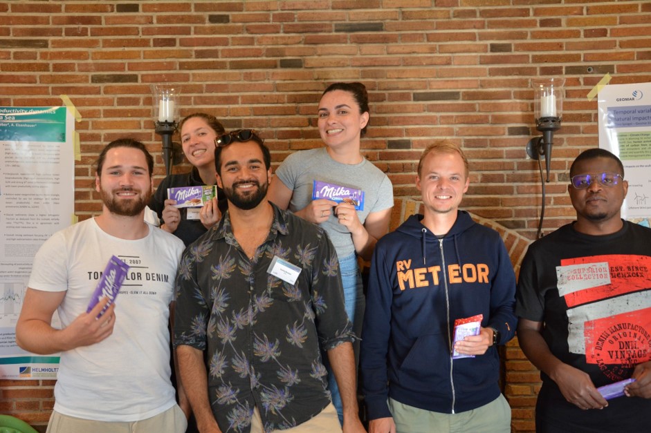 The lucky winners of the hackathon with their prize - a bar of chocolate! Photo: DokTeam