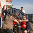 Preparing and launching the drifter (Credit: Lisa Hoffmann, CC BY-NC-ND)